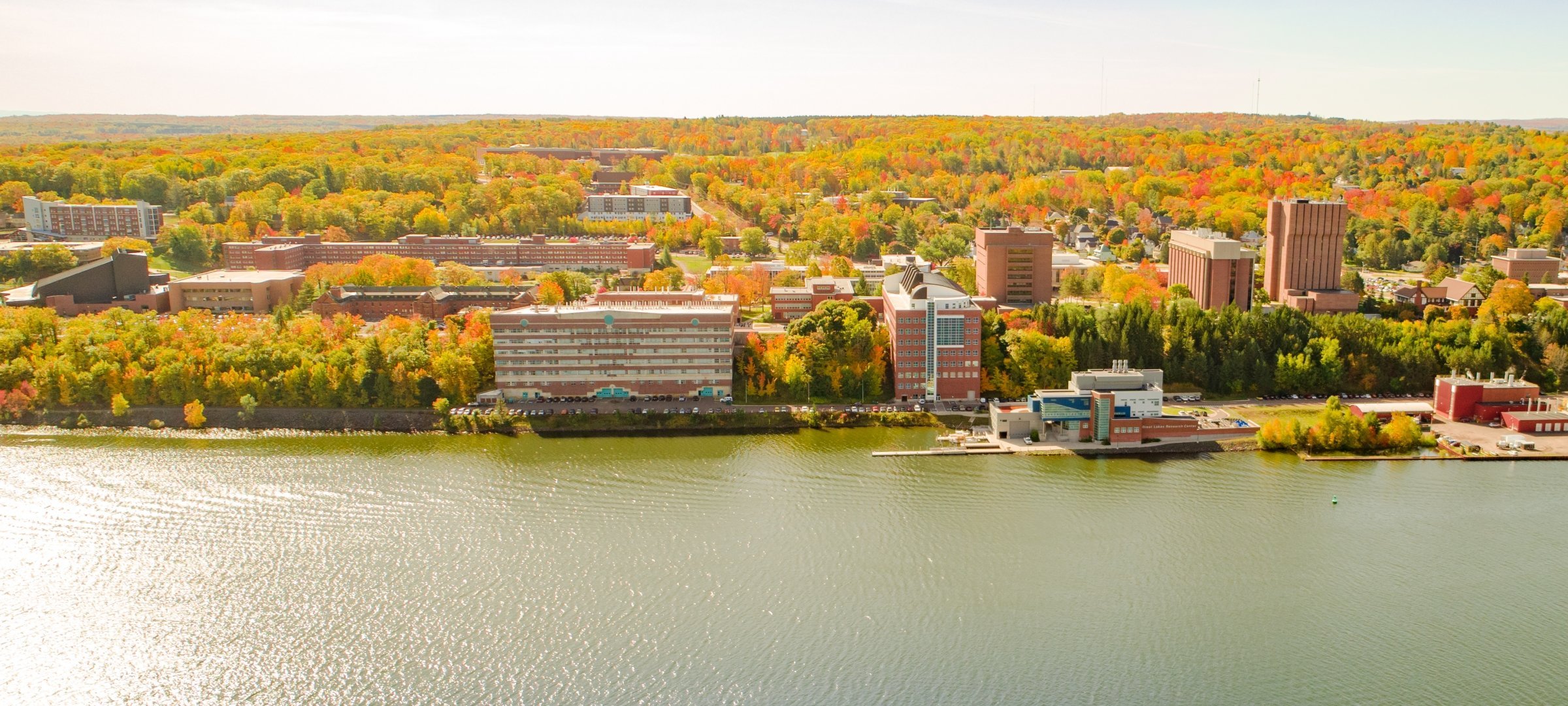 Aerial view of Michigan Technological University's campus next to the Portage Canal.
