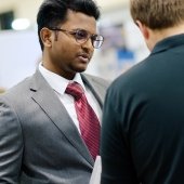 Student talks with recruiter at MTU Career Fair