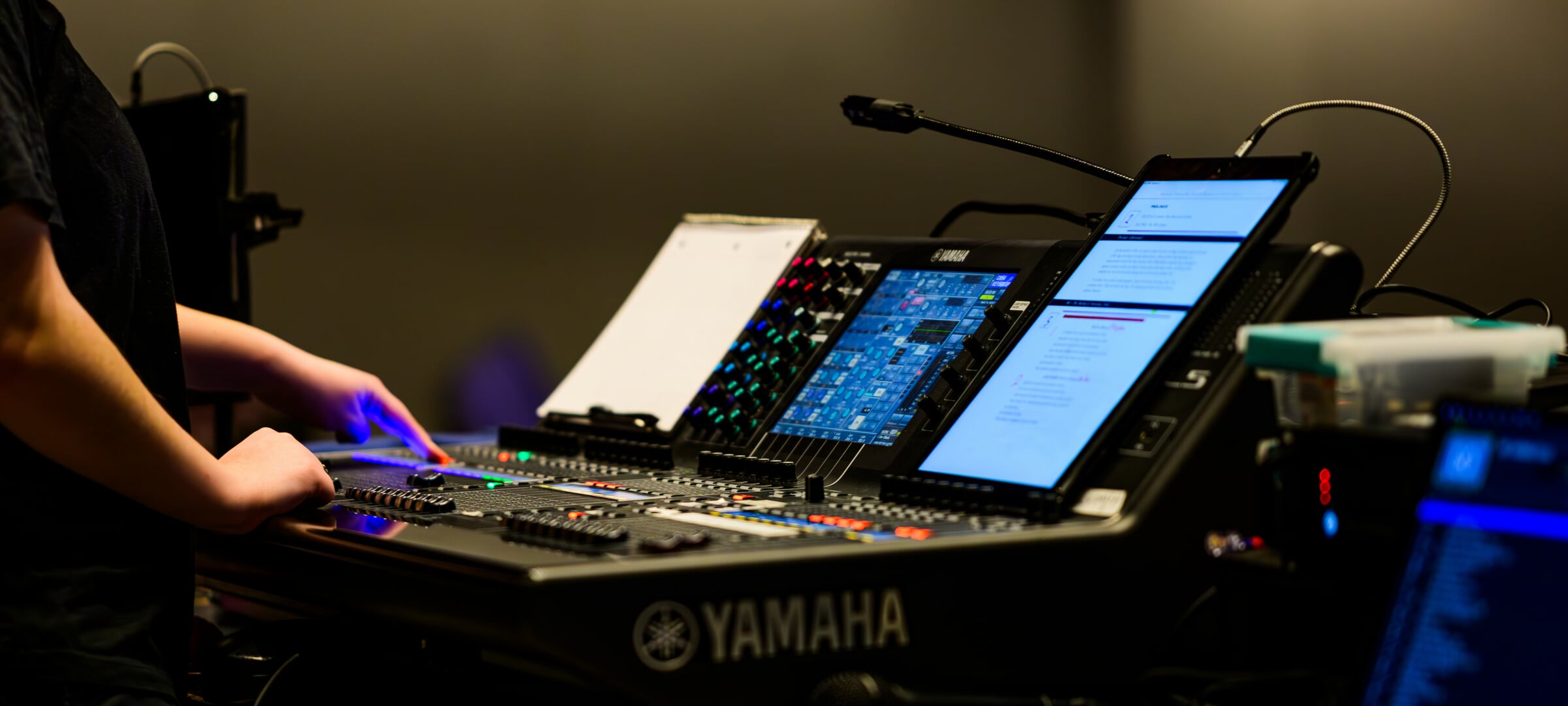 Student operates a sound board