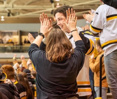 Fans celebrating in the MacInnes Ice Areana