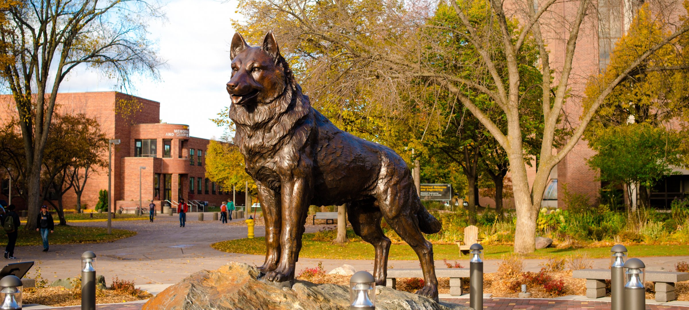 Husky statue at the center of Michigan Tech's campus.