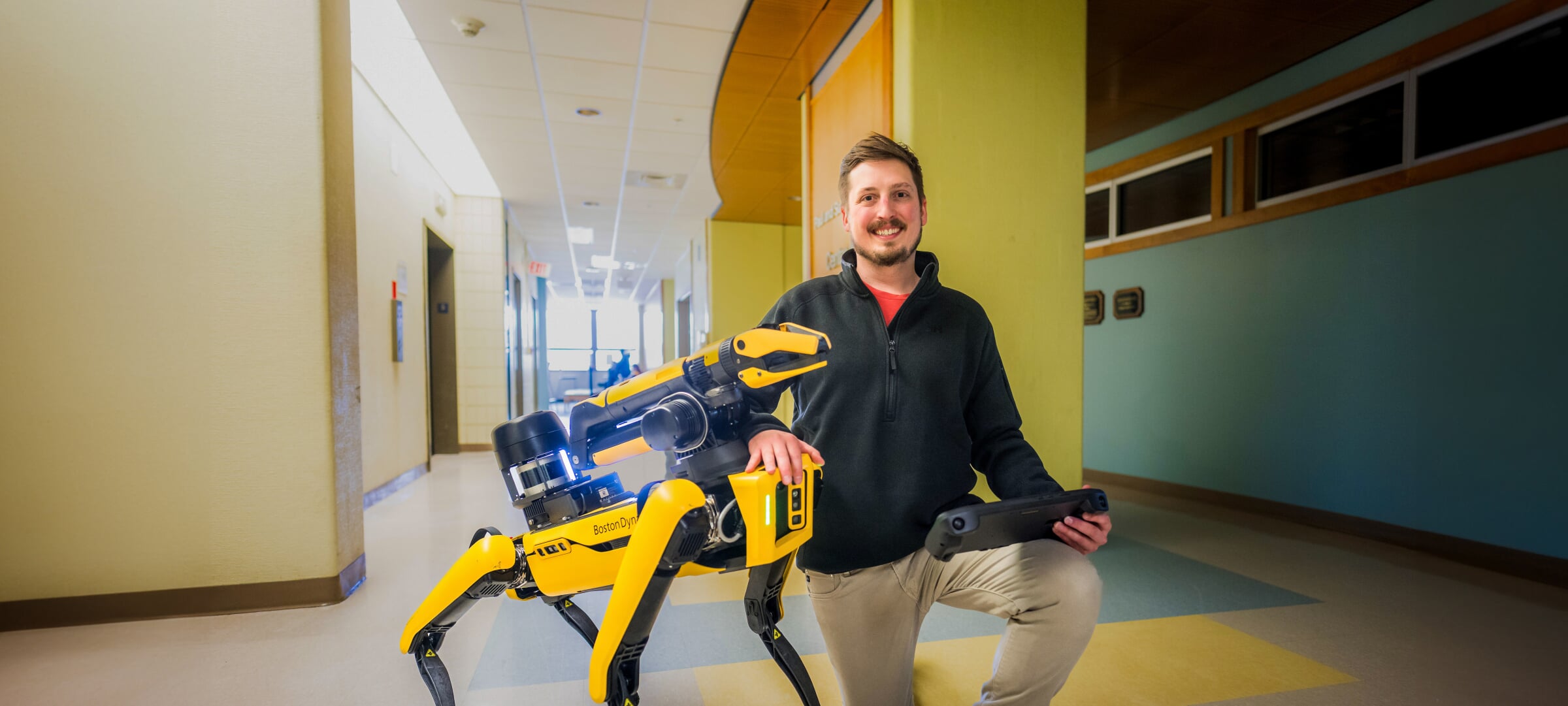 A researcher in the College of Computing introduces Balto, the robotic dog