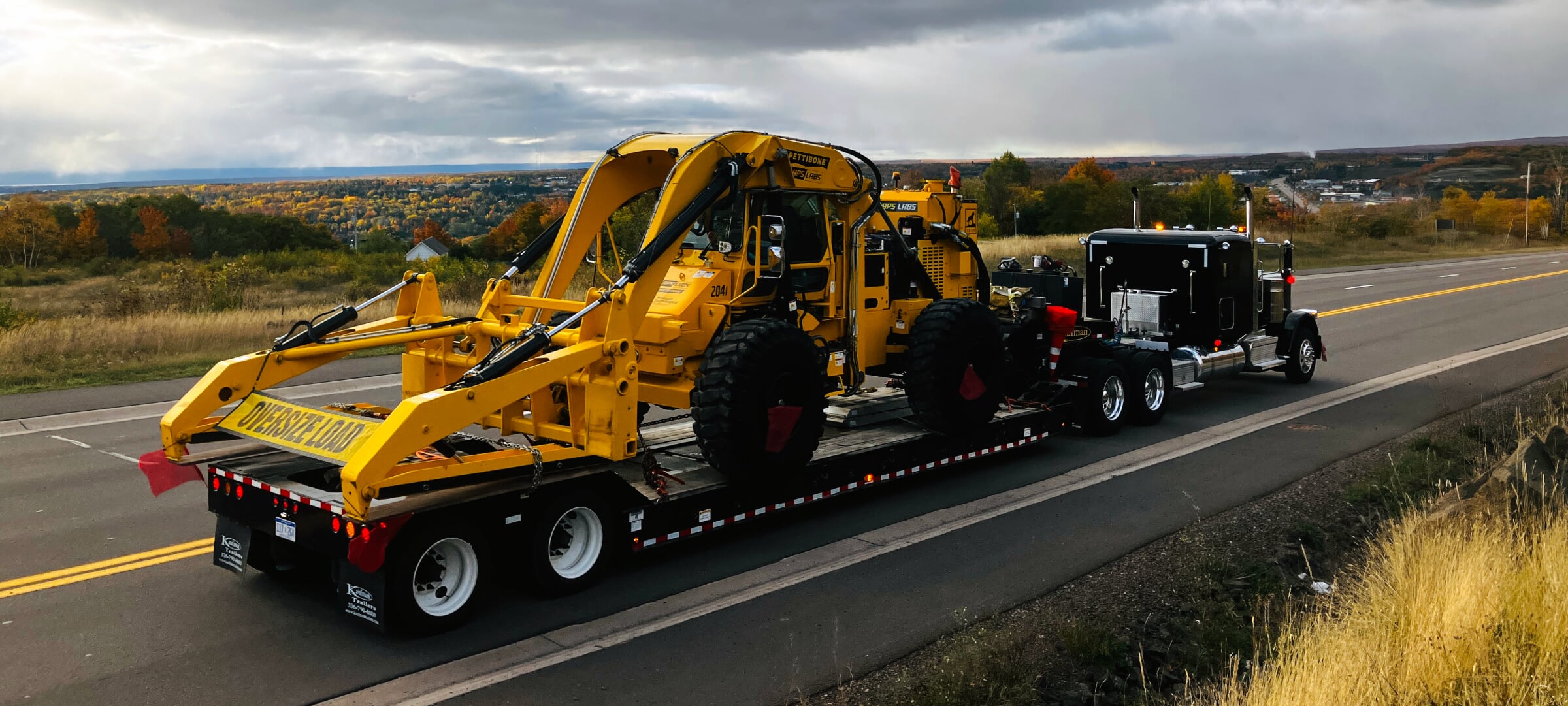 Pettibone loader on trailer