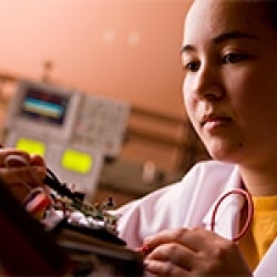 Woman Soldering