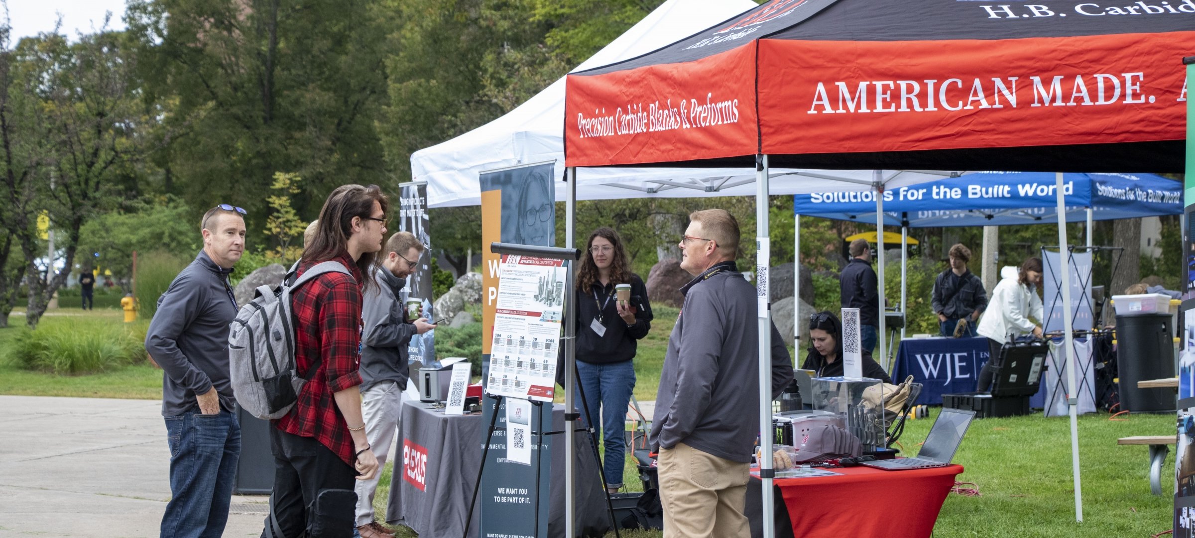 Career advisors helping students prepare for a career fair