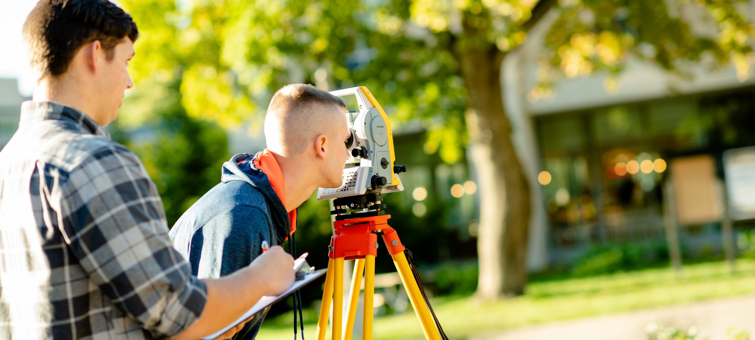 Surveying outdoors for geospatial engineering.