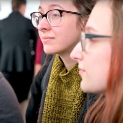 Students watching a presentation.