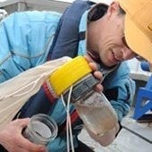 A researcher working with water