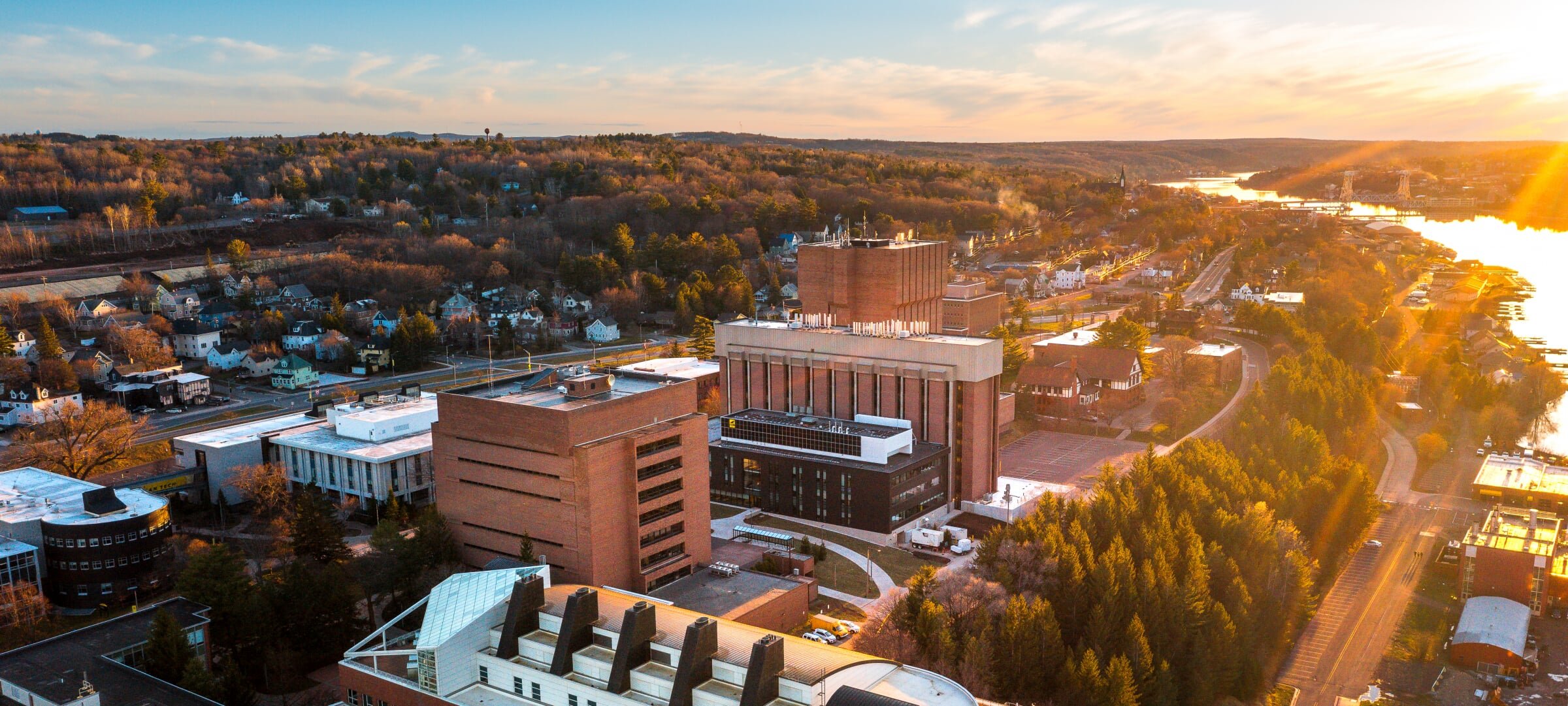 Aerial view of campus during sunset.