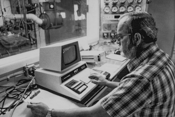 Man testing a computer in a lab