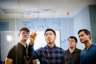 Assistant Professor Brian Yuan and students Tyler Zetty, Shiwei Ding, and Saket Chaturvedi
