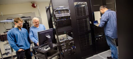 Faculty and student in computer server room