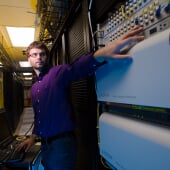 Person standing in server room
