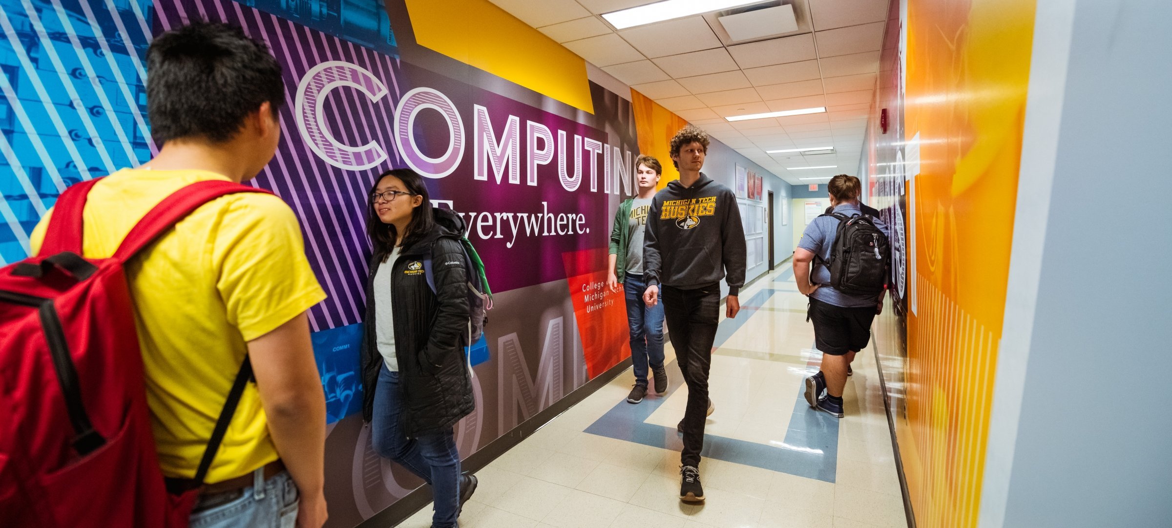 Current students in the hallway of the College of Computing.