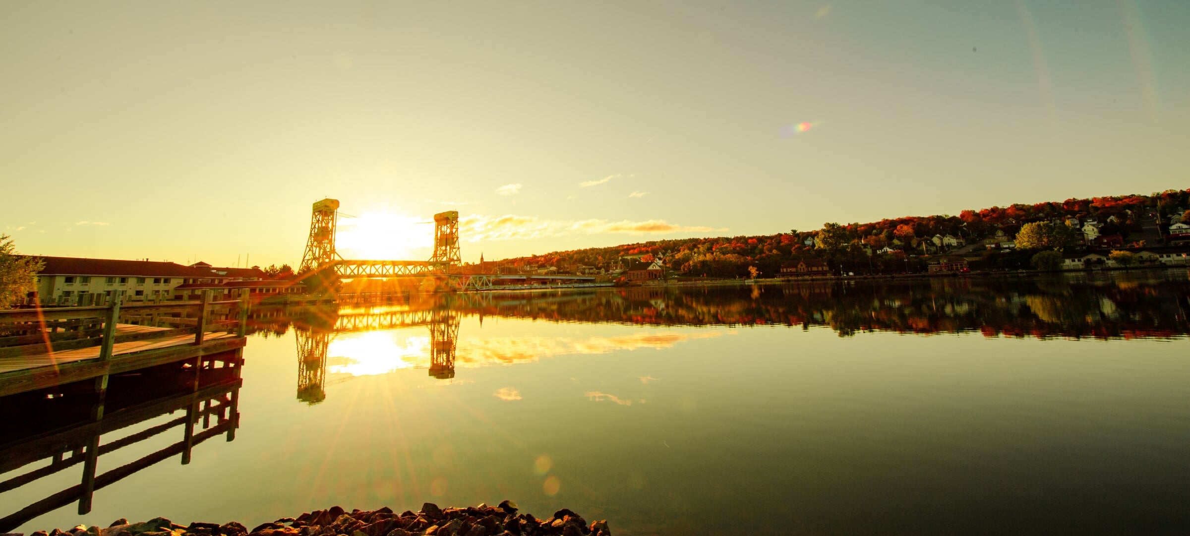 Aerial view of Michigan Tech Campus from the Portage Canal at sunset