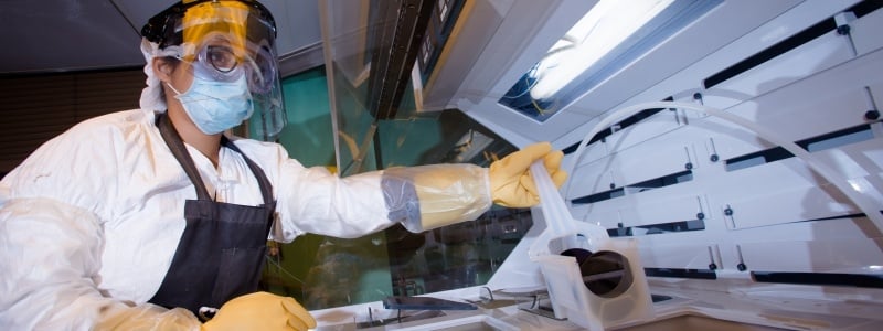 Scientist working with nano materials in a lab.