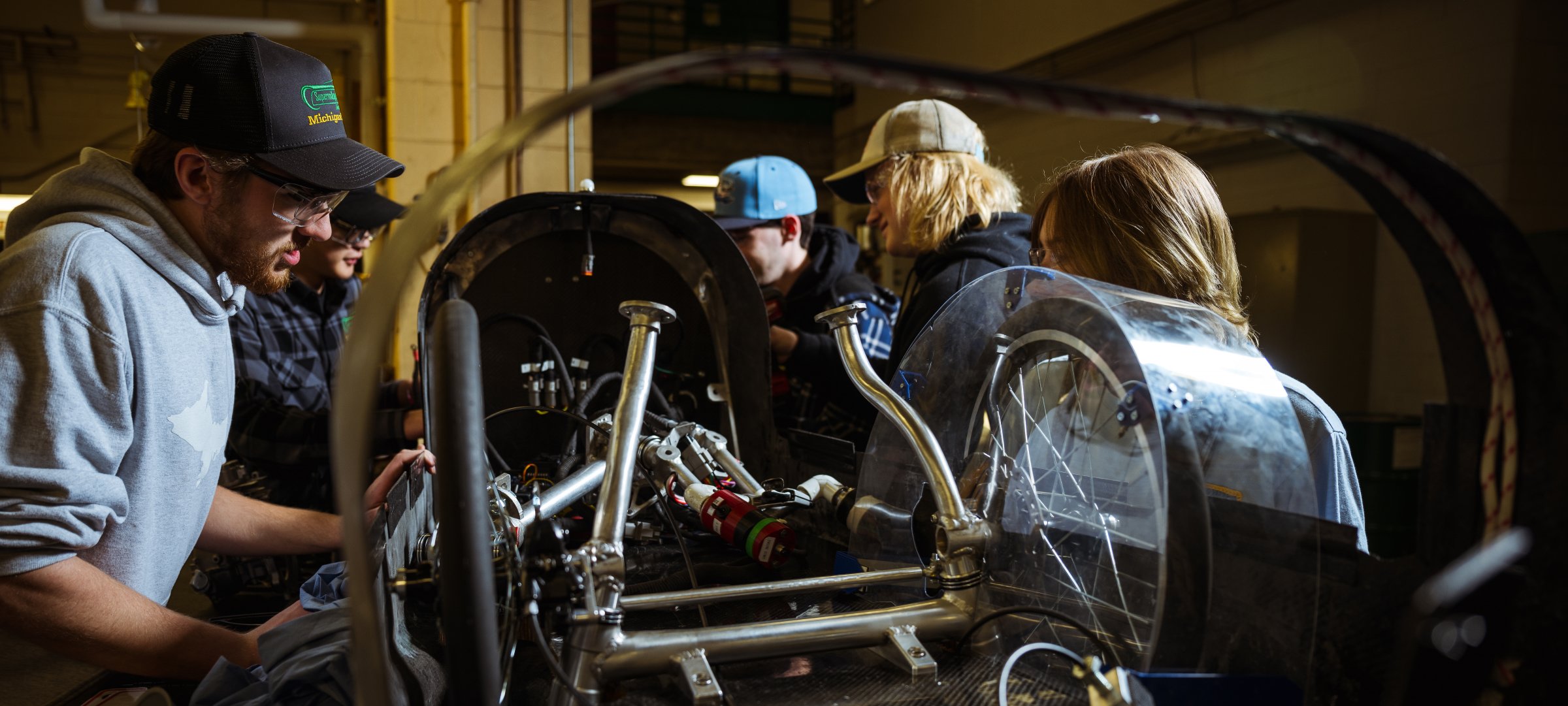 Supermileage Systems Enterprise students work in their lab