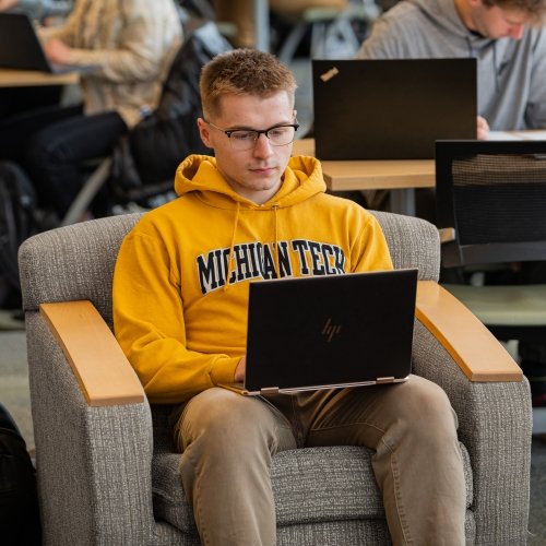 Student on a laptop in the library