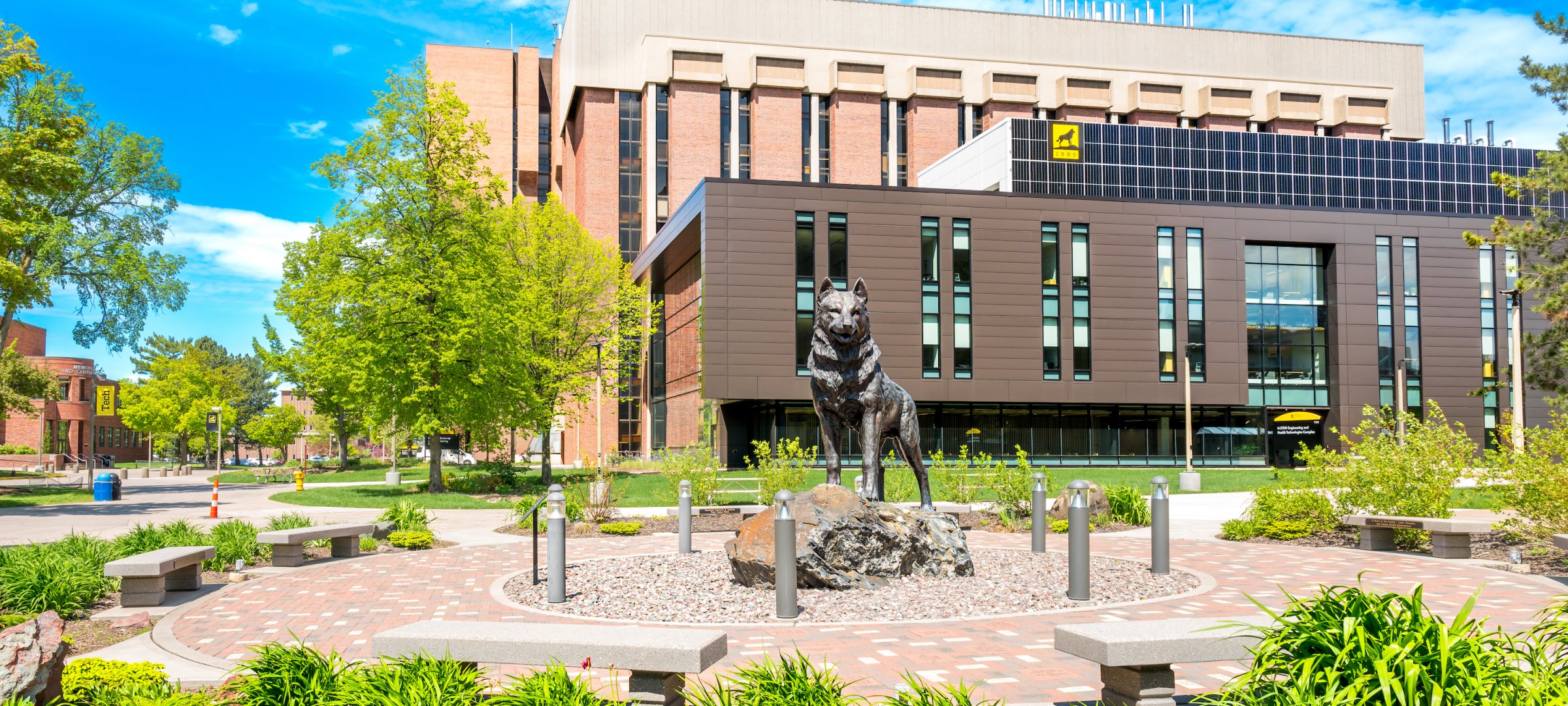 Husky Plaza with H-STEM Complex in the Background on a summer day