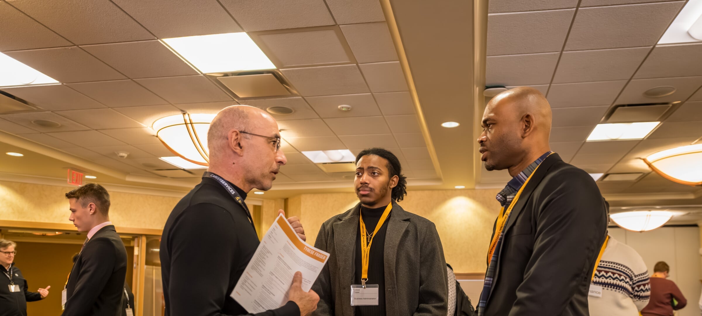 People interacting at a career fair
