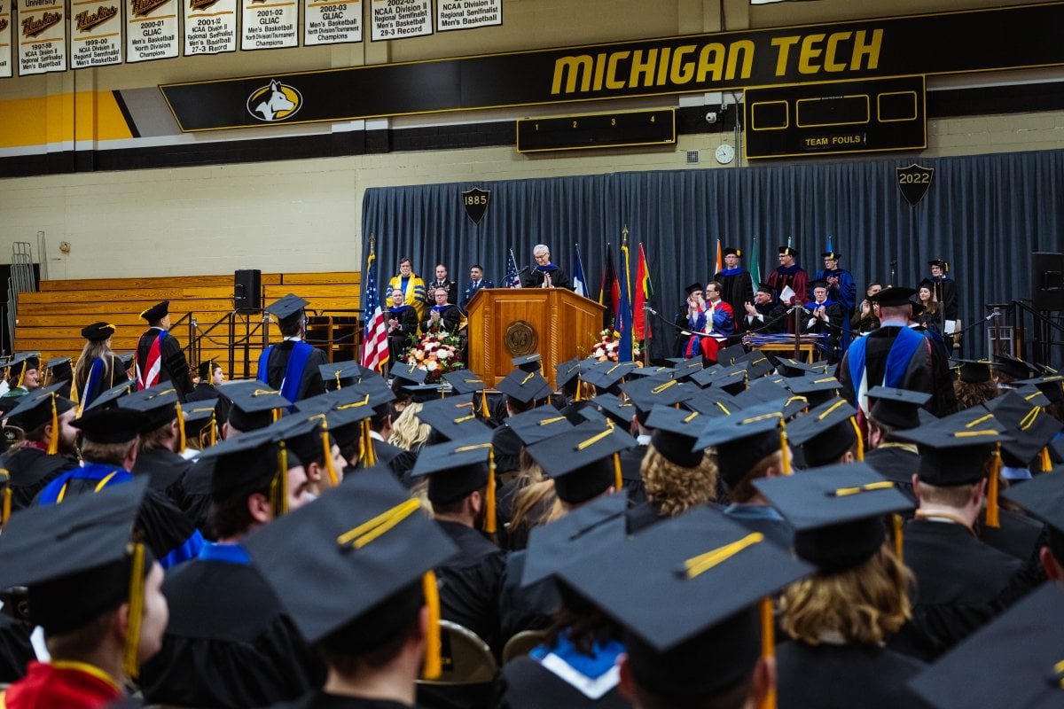 Students at commencement in the wood gym