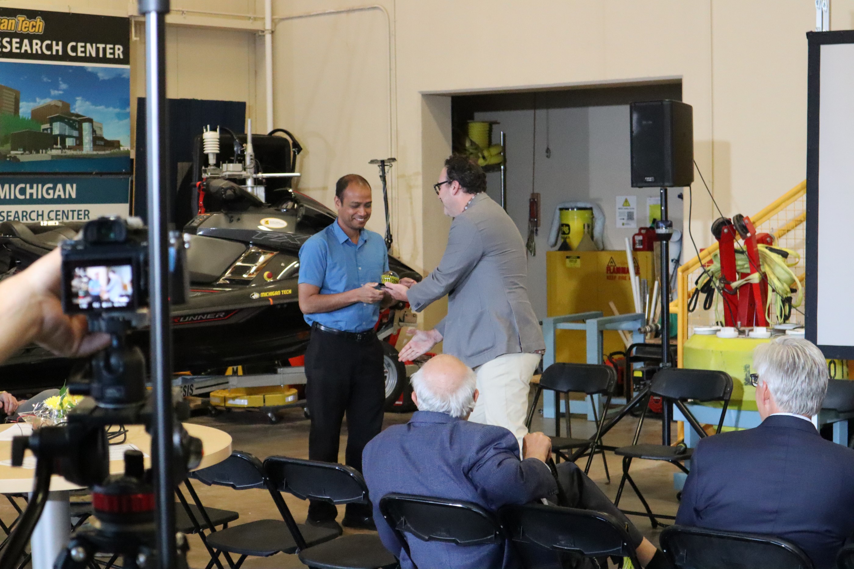 Susanta Ghosh recieving his ICC Achievement Award. Susanta Ghosh being handing an award.