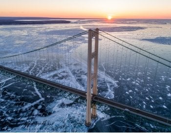 Sun setting behind the Mackinac Bridge.