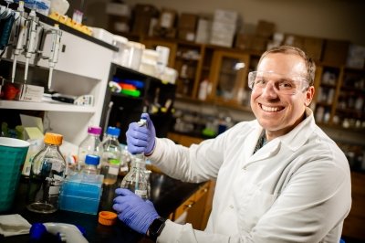 Stephen Techtmann working in the lab.