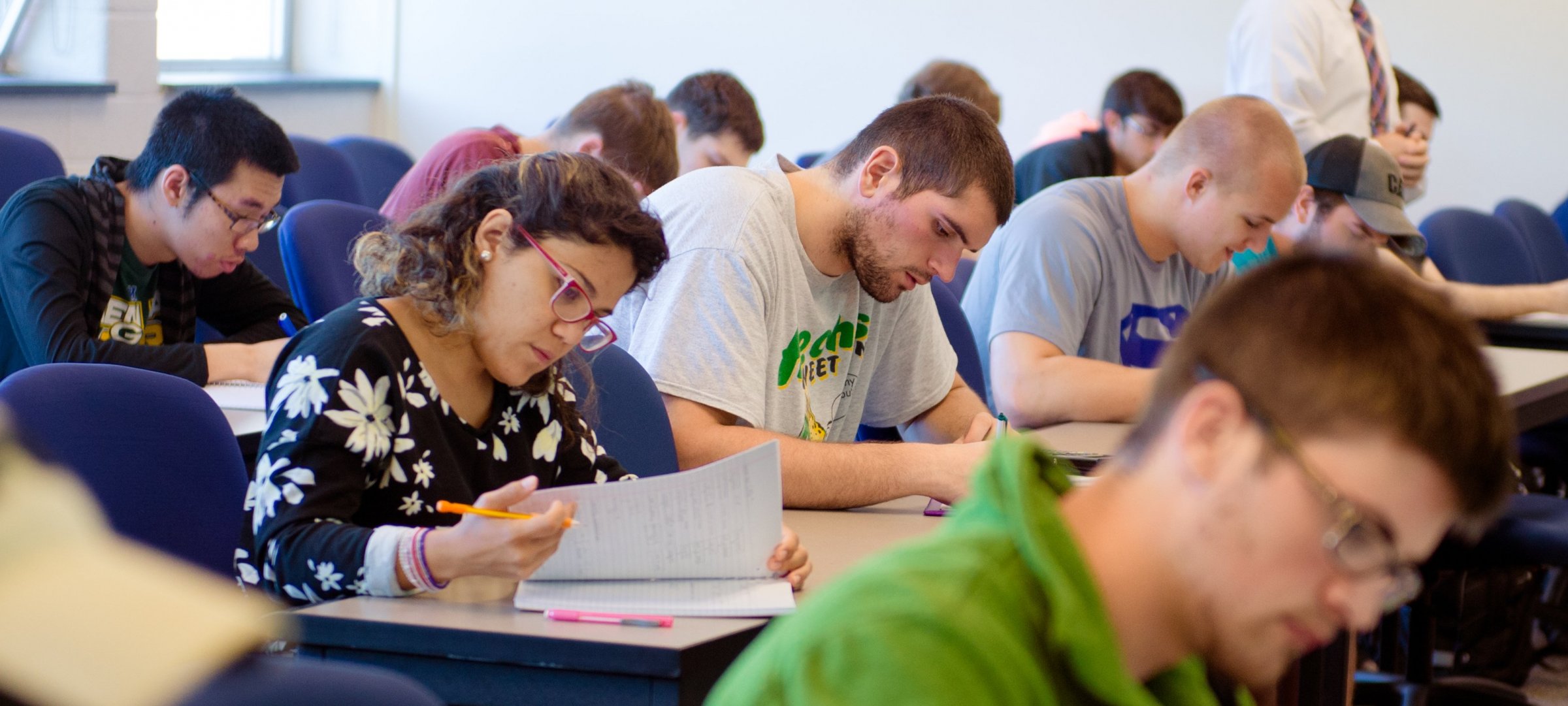 Students working through projects in a classroom