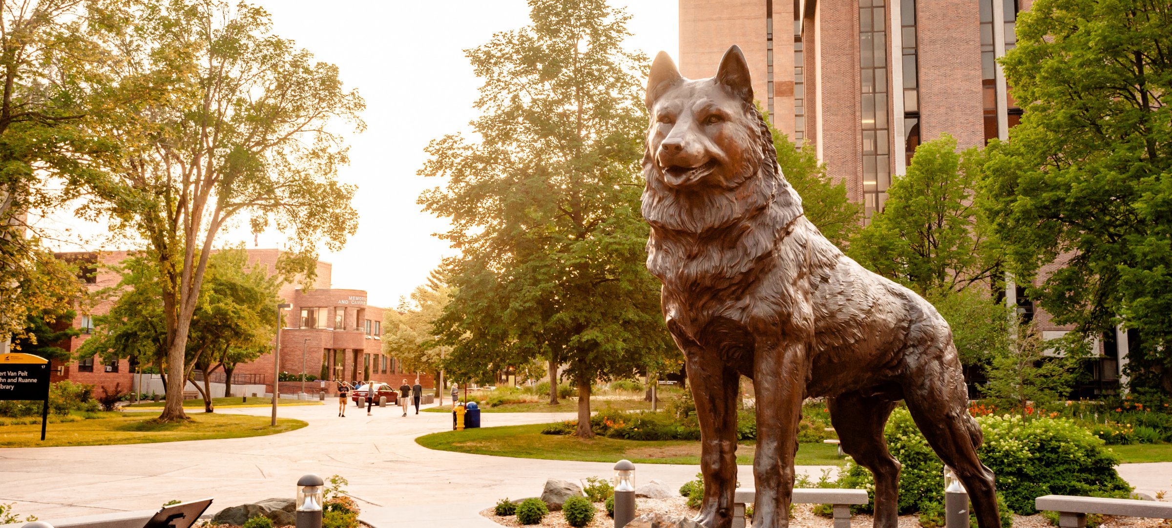 Husky statue in sunset.