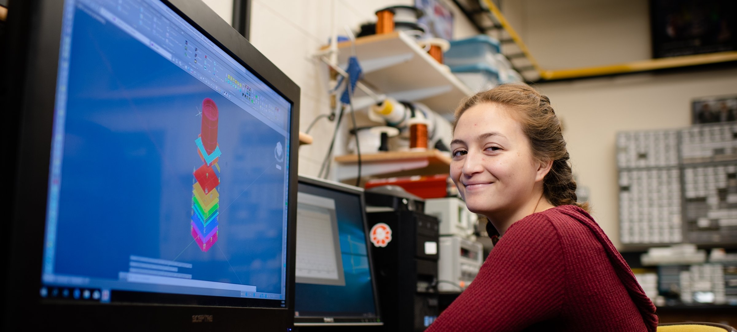 Student working on a CAD drawing on a computer.