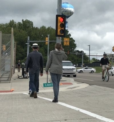 People crossing at a crosswalk.