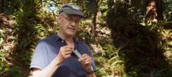 Thomas Werner in the woods prepping a vial.