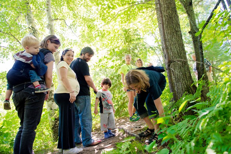 NCA Vuln Families walking through the woods.