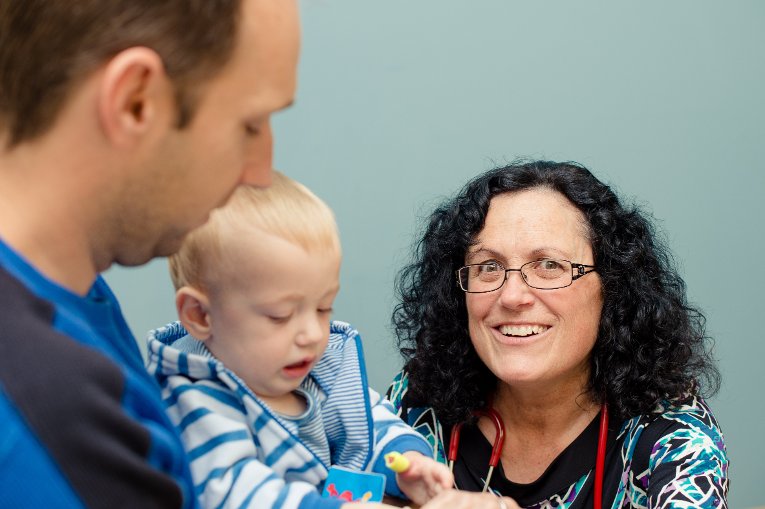 NCA Human Health Parent and child at the doctor's.