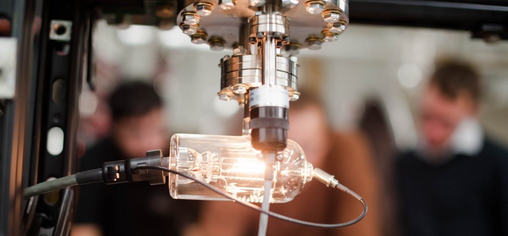 The glowing hot-cathode ionization gauge measures nothing, literally. It measures the level of vacuum within a space-simulation chamber that enables ground-based testing of full-scale flight systems. A glowing hot-cathode ionization gauge.