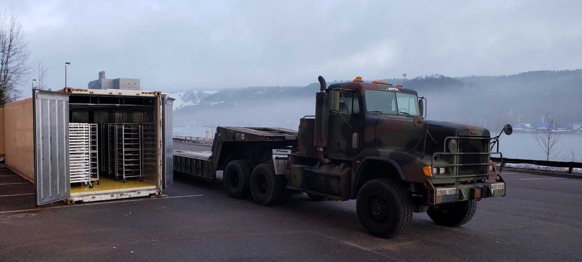 The National Guard is ready to deploy the Mobile Thermal Utility Sanitizer (MTU Sanitizer) that Sidona DeBrule and Lindsey Wells worked on alongside other University engineers, Credit: Andrew Barnard semi truck and trailer