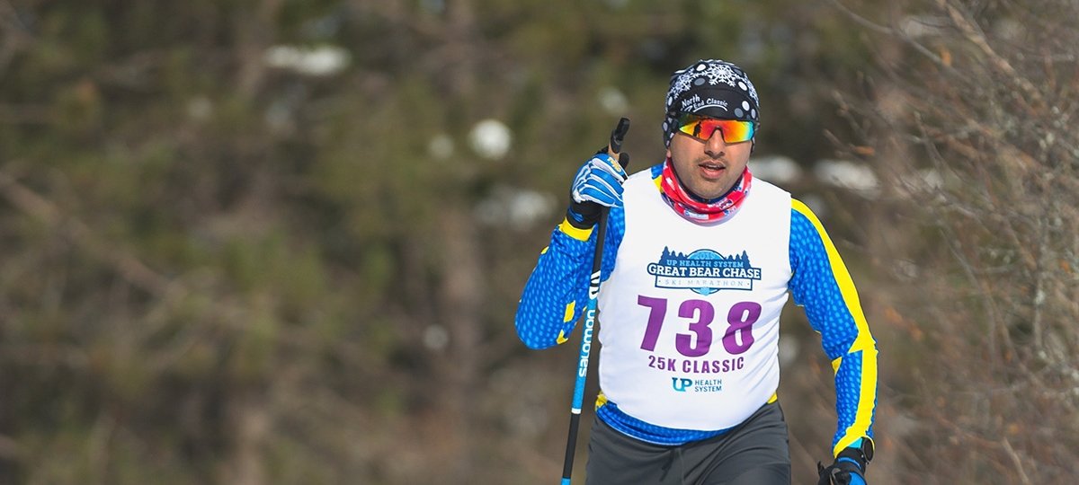 Cross-country skiing is one of the core activities that helps Gowtham joyfully connect with both his personal development and his community. Here, he competes in a past Great Bear Chase. This year, he was an event volunteer. Gowtham skiing.