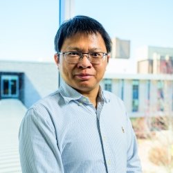 Cybersecurity expert Bo Chen, who recently won the Michigan Tech Bhakta Rath Research Award, smiles during a photo session in Rehki Hall, College of Computing.