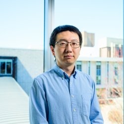 Cybersecurity researcher Niusen Chen has his portrait taken after co-winning the 2024 Bhakta Rath Research Award at Michigan Tech