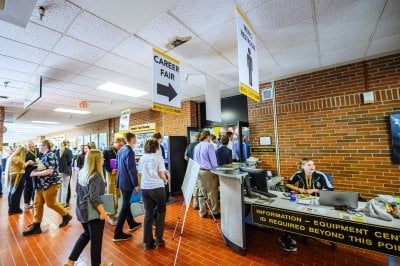 Students in line waiting to get into the multipurpose room in the SDC.