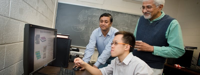 Department Chair Ravi Pandey collaborating with researchers