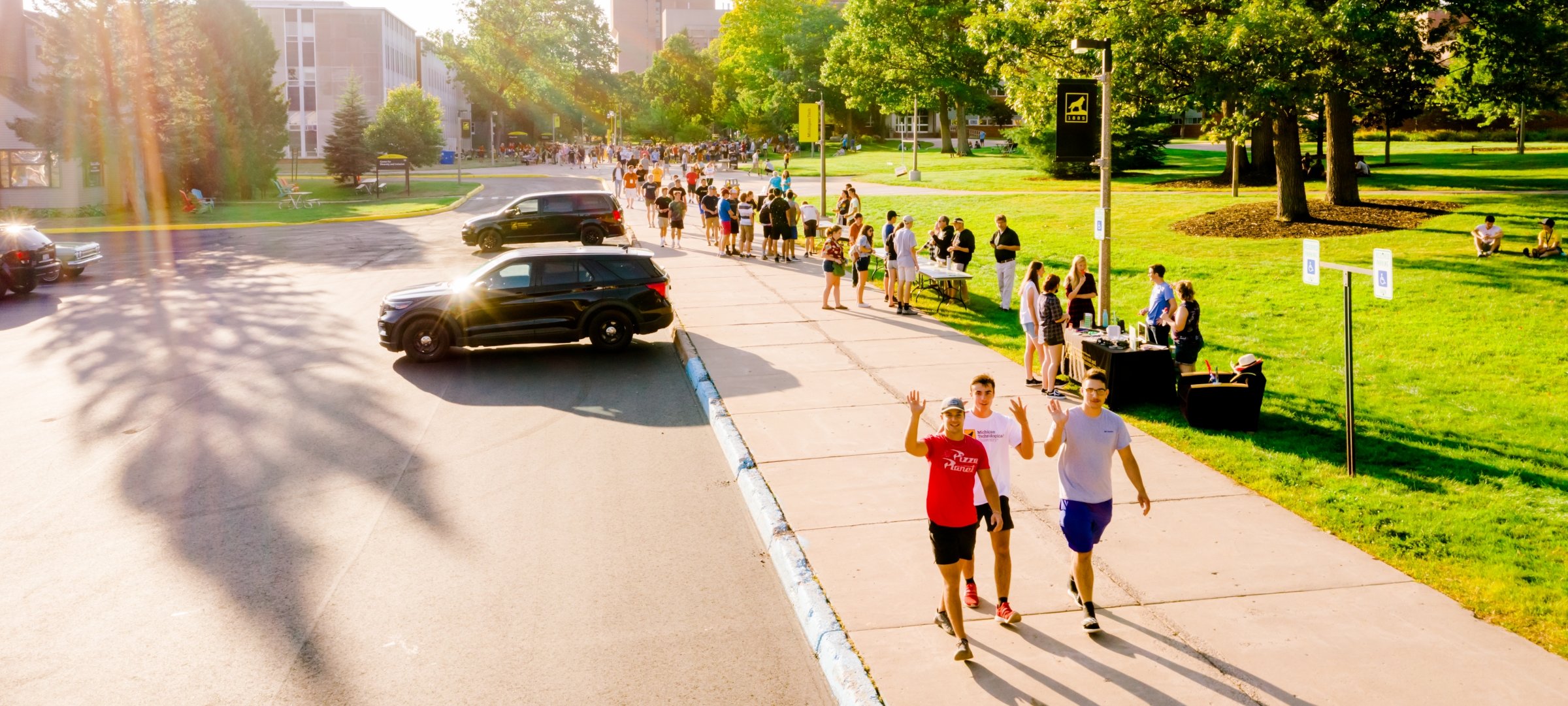 Students walking on MTU campus. New Student Housing