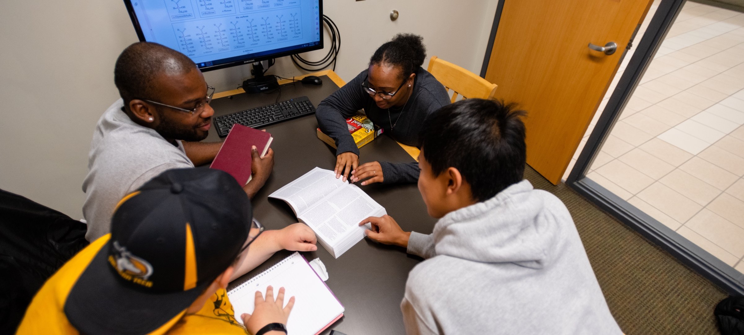 Students studying in library