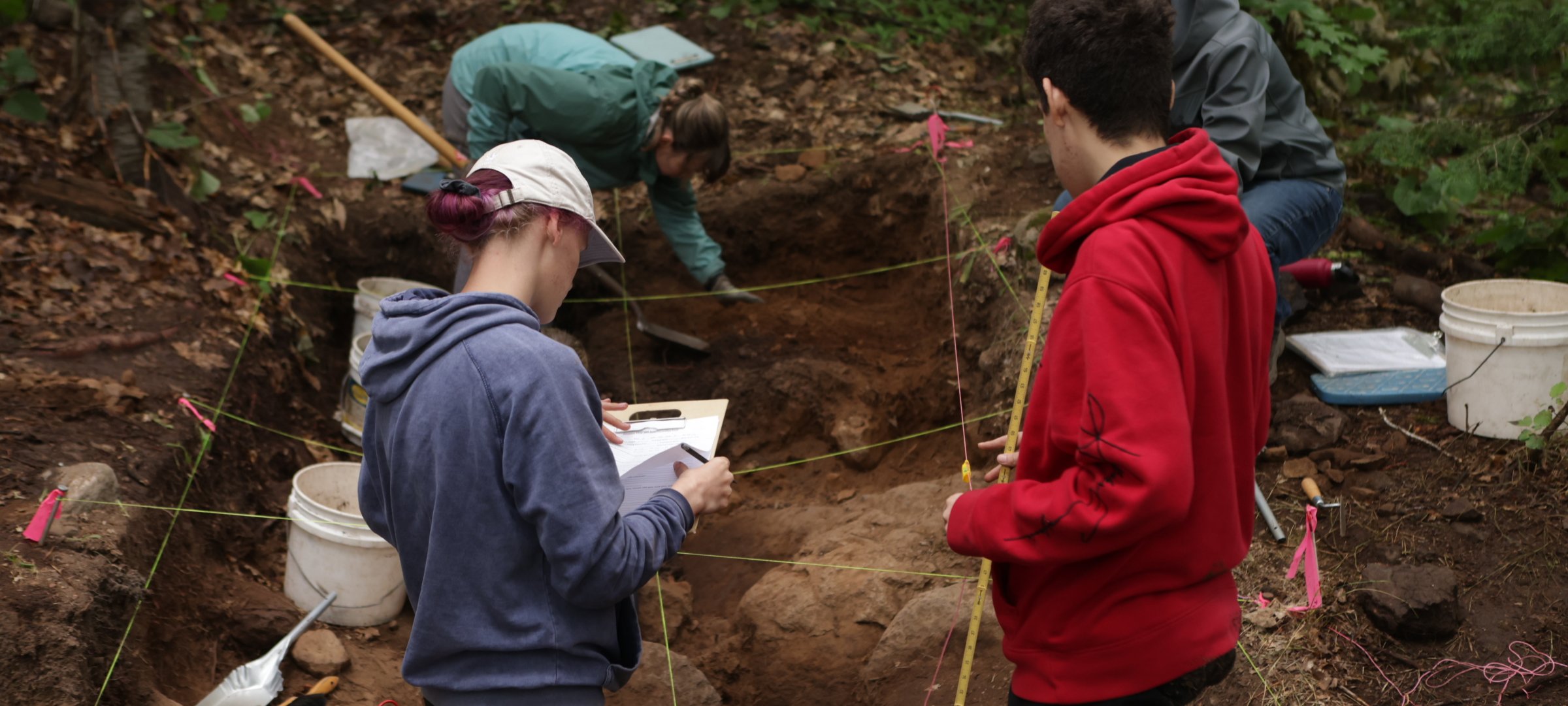 Students digging for artifacts during summer field school