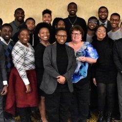 Karen Wade standing with students in NSBE