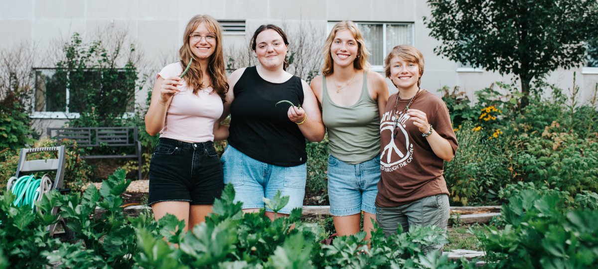 students standing together in garden