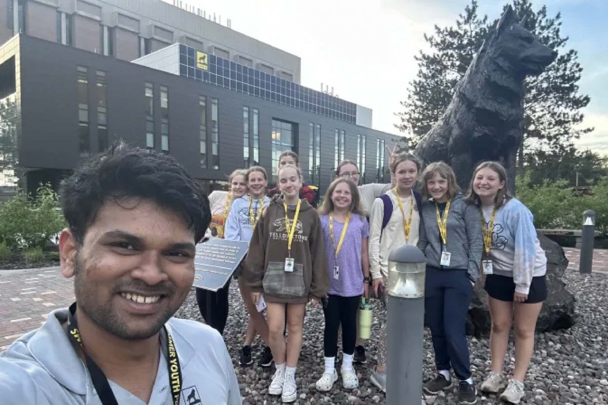 students in front of husky