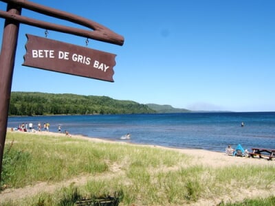 Bete De Gris Beach and water with Bete De Gris Bay sign.