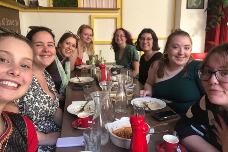 Study Abroad students having dinner.